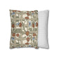 Decorative pillow with floral pattern next to a striped pillow on a white background