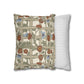 Decorative pillow with floral pattern next to a striped pillow on a white background