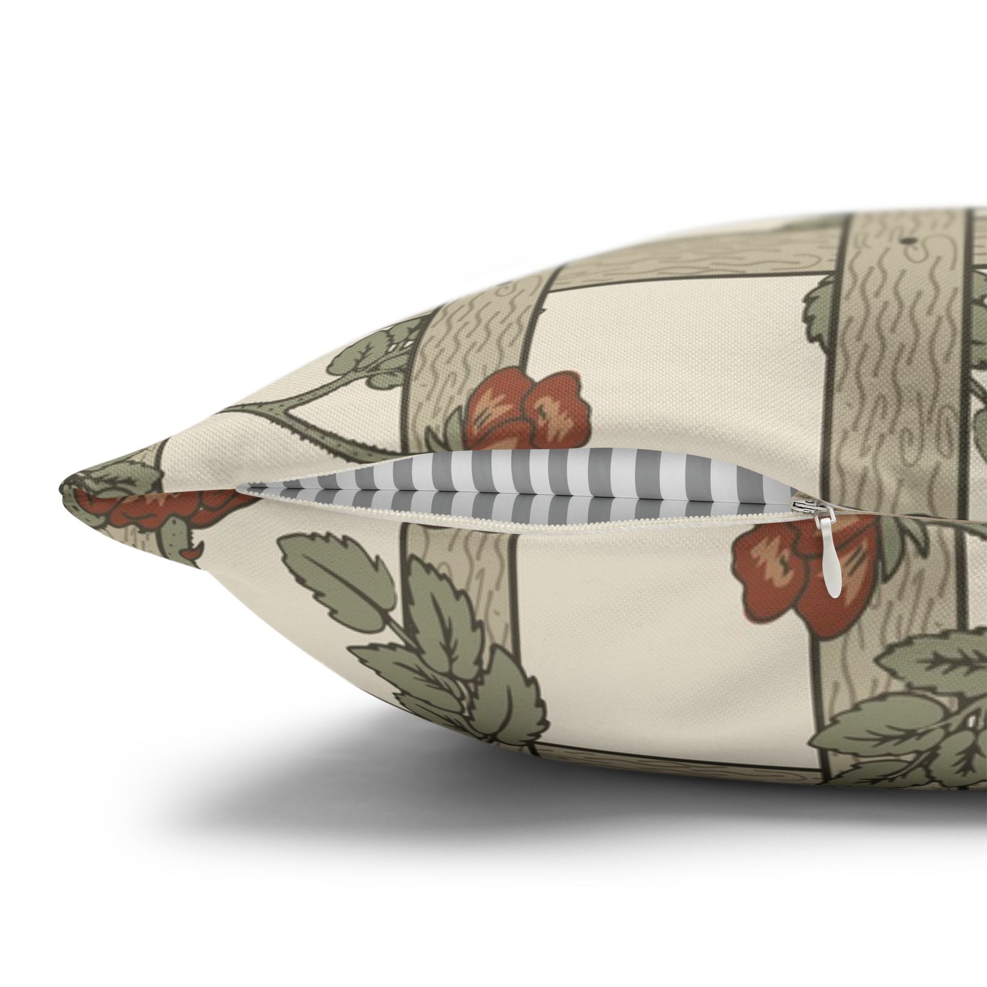 Decorative pillow with floral pattern and zipper on a white background