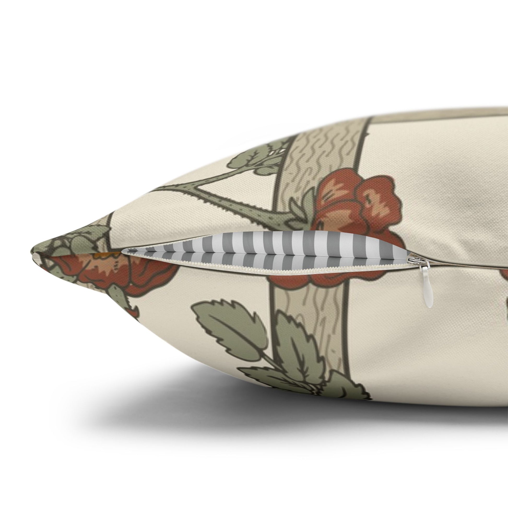 Floral-patterned pillow with a zipper on a white background