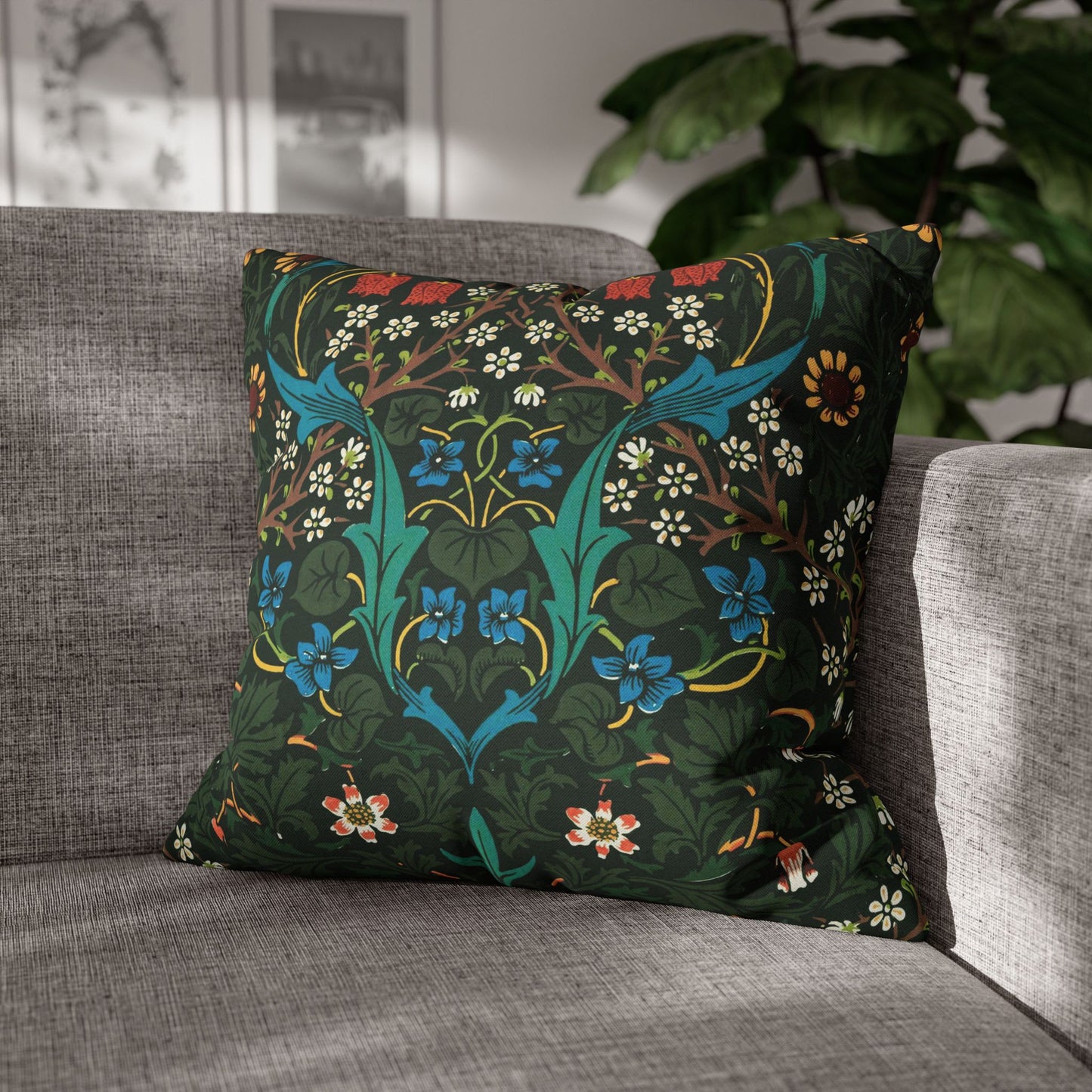 Decorative pillow with floral pattern on a gray sofa - William Morris Tulip