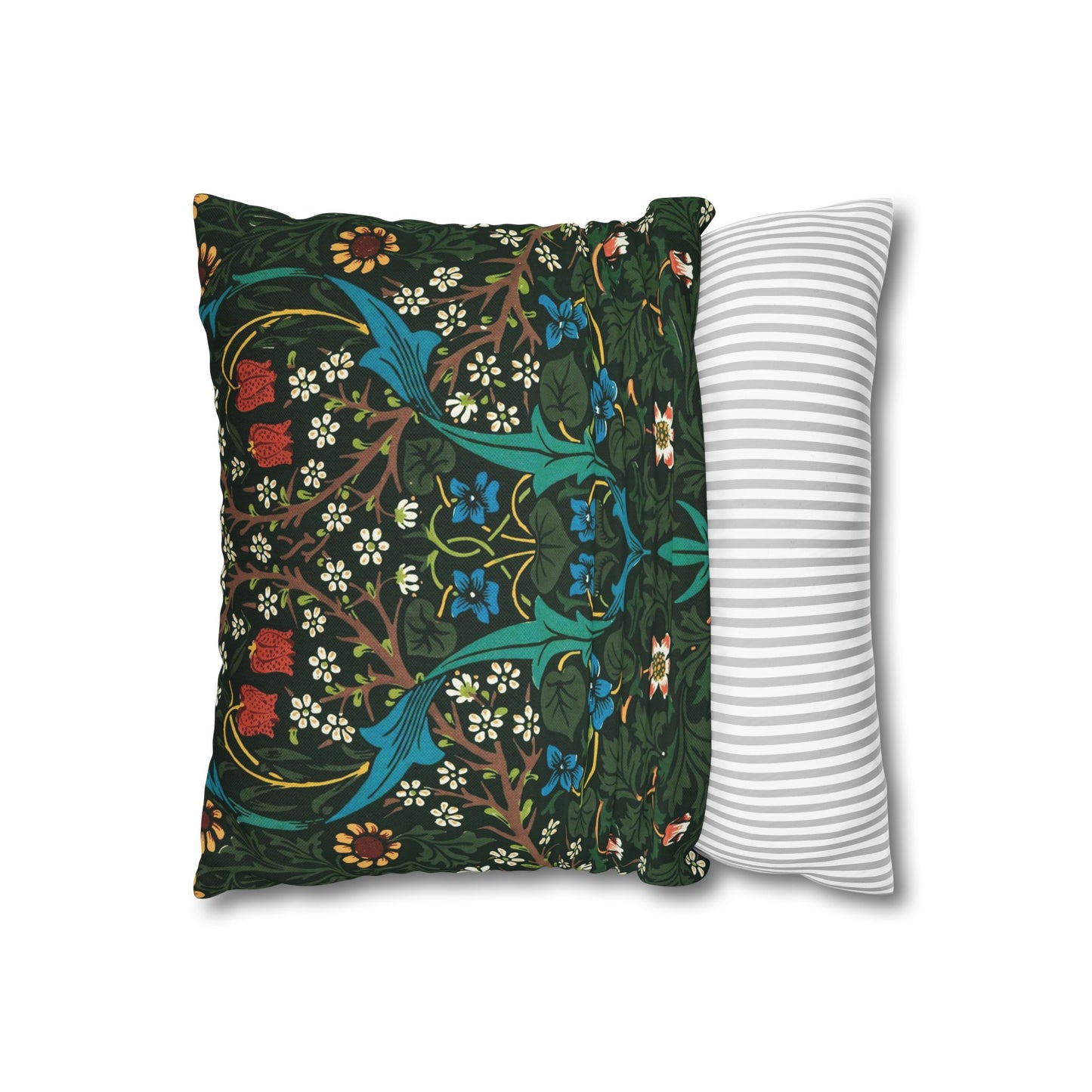 Decorative pillow with floral pattern next to a striped pillow on a white background - William Morris Tulip