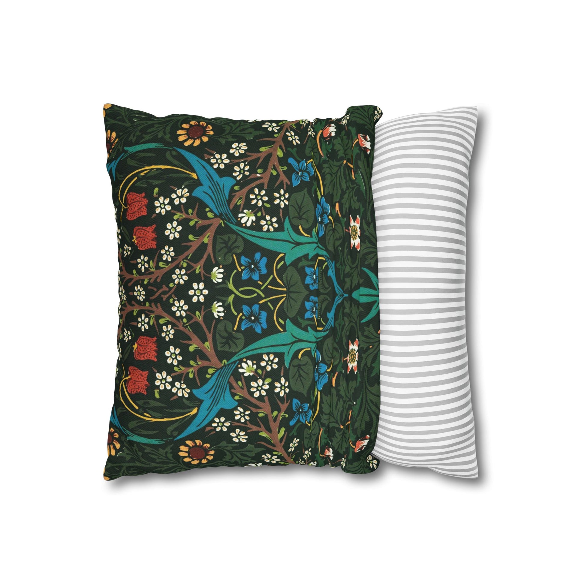 Decorative pillow with floral pattern next to a striped pillow on a white background - William Morris Tulip