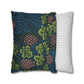 Two pillows, one with a floral pattern and the other with a striped pattern, on a white background.