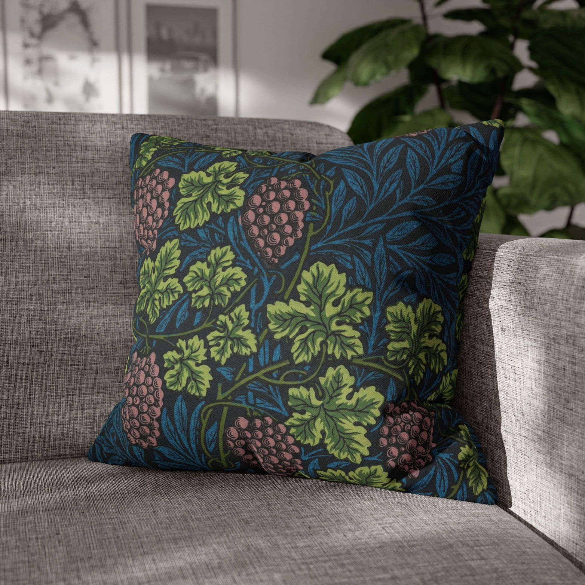 Decorative pillow with floral pattern on a gray sofa