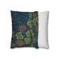 Decorative pillow with floral pattern and striped pillow on a white background