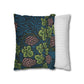 Two pillows, one with a leafy pattern and the other with a striped design, on a white background.