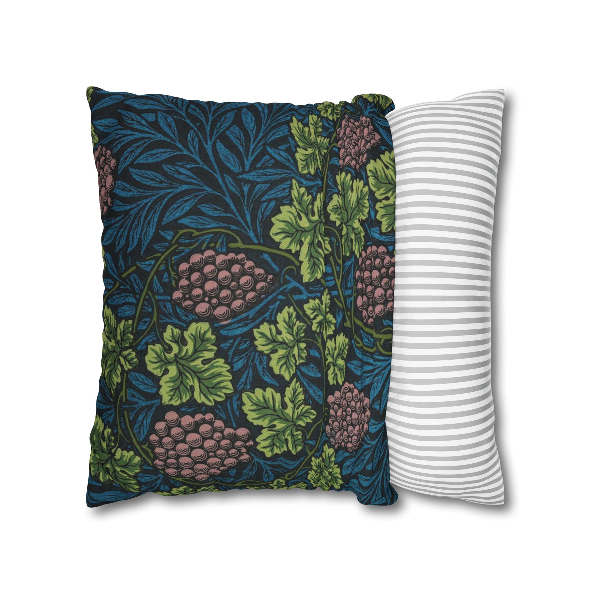 Two pillows, one with a floral pattern and the other with a striped pattern, on a white background.