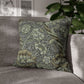 Decorative pillow with floral pattern on a gray sofa
