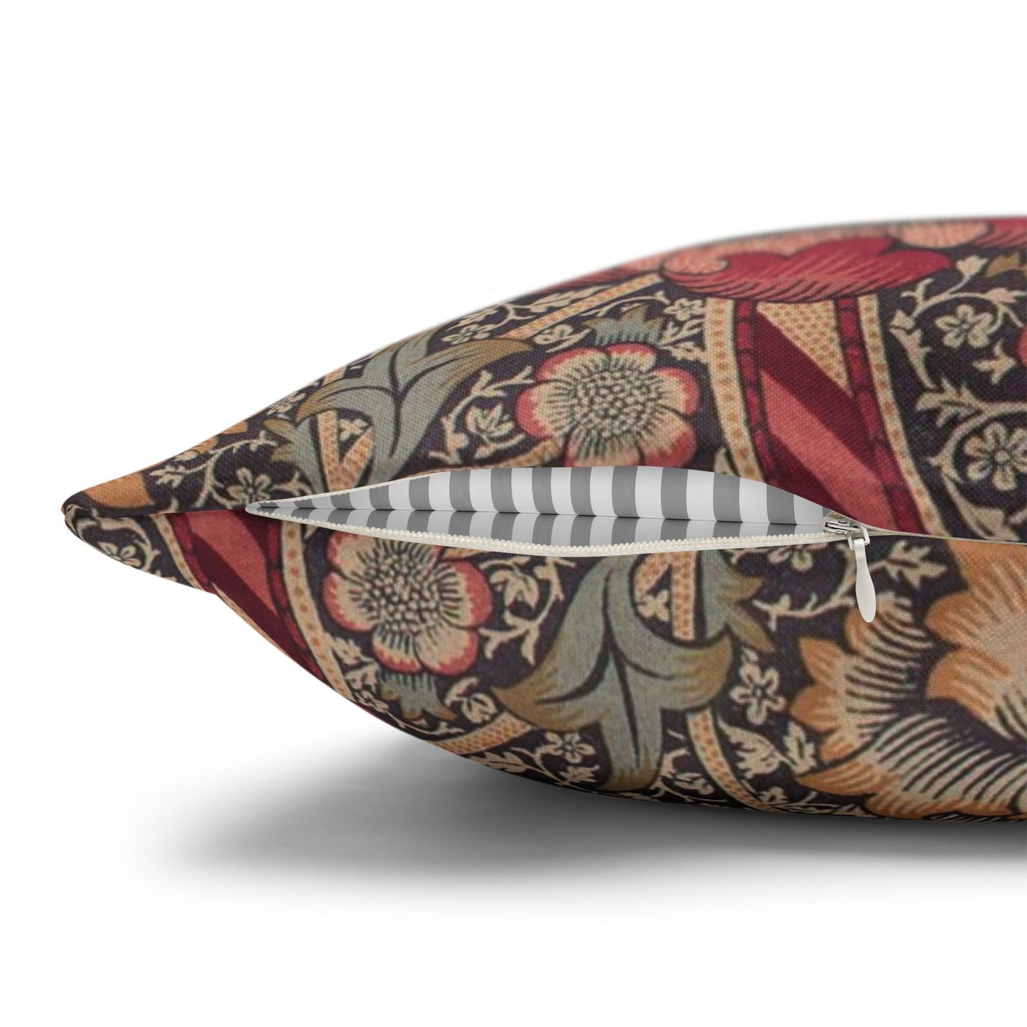 Decorative pillow with floral pattern on a white background