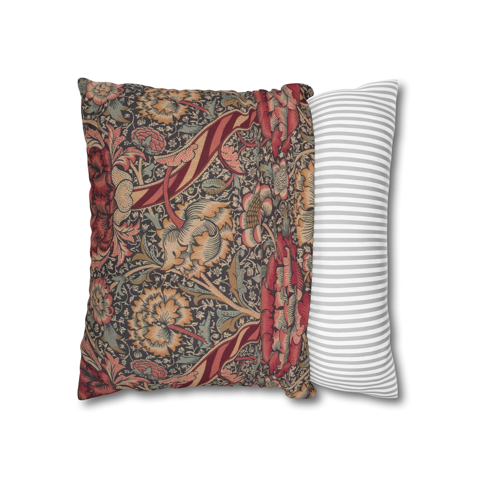 Two pillows, one with a floral pattern and the other with a striped pattern, on a white background.