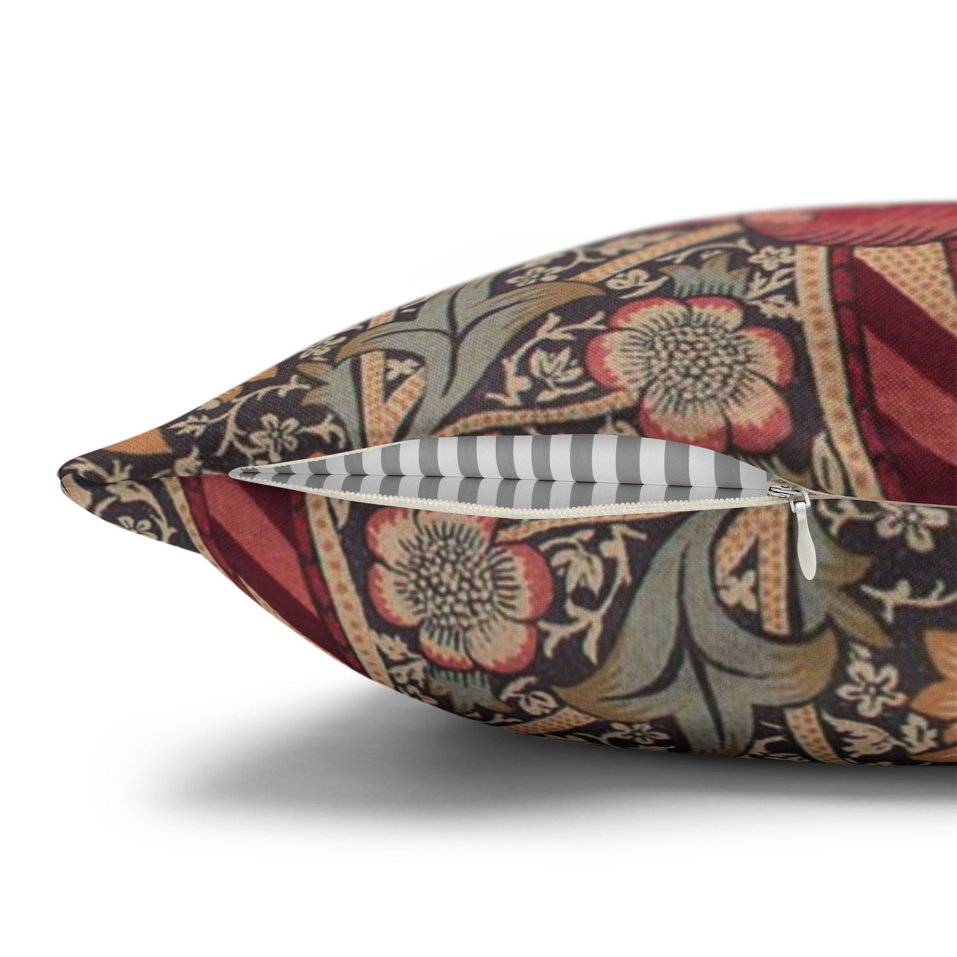 Decorative pillow with floral pattern on a white background