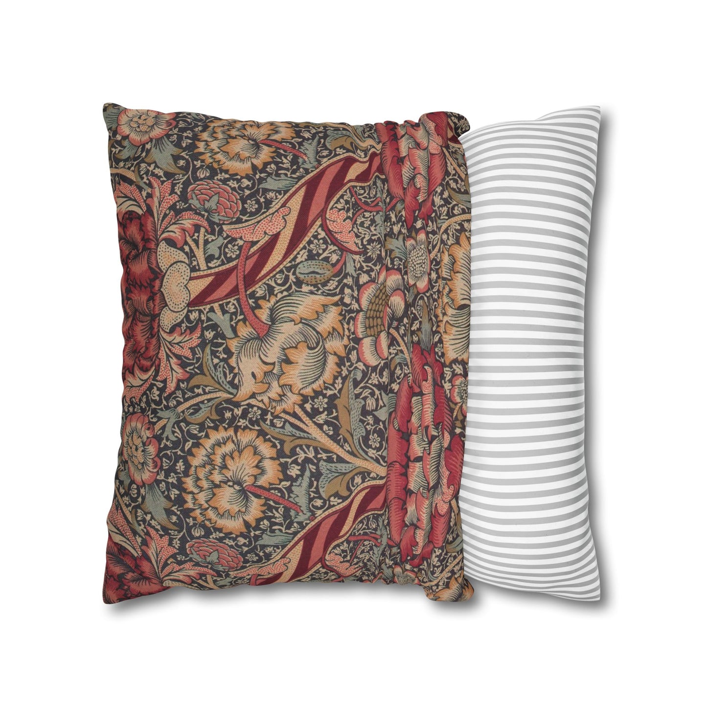 Two pillows, one with floral pattern and one with stripes, on a white background