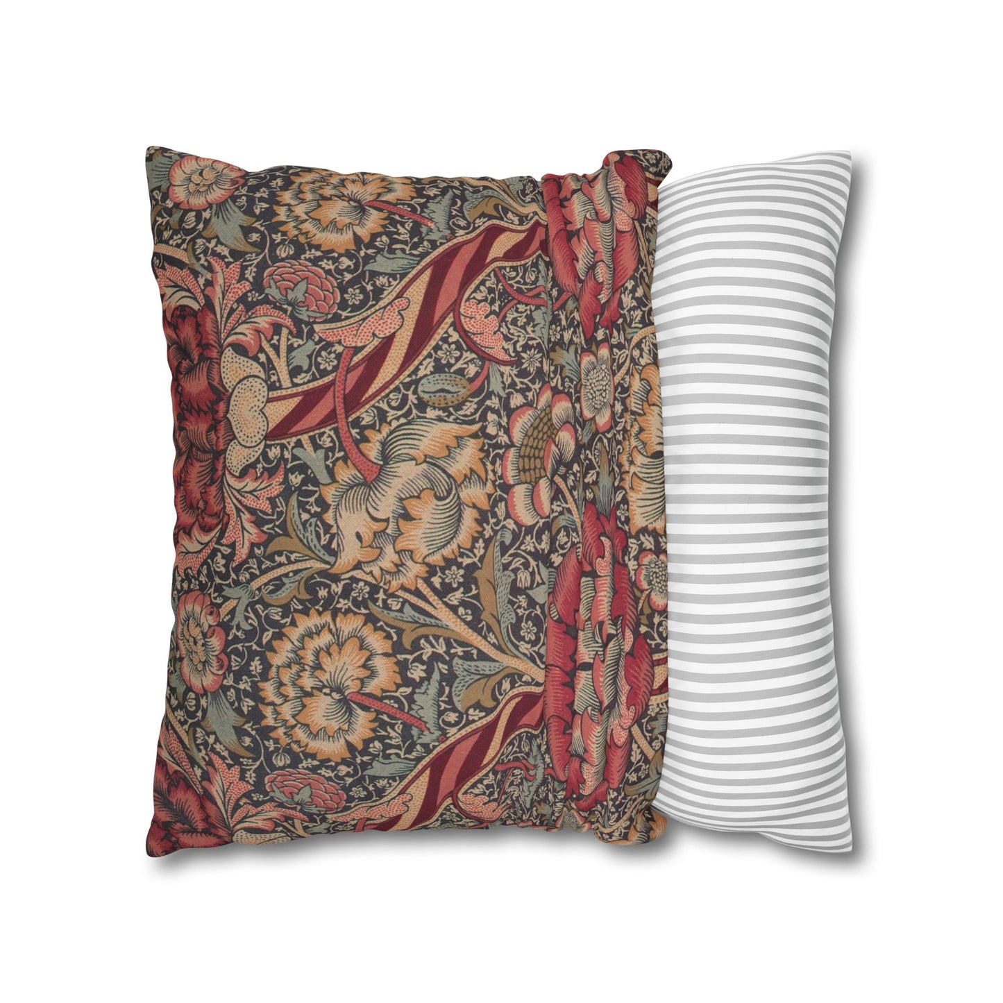 Two pillows, one with floral pattern and one with stripes, on a white background