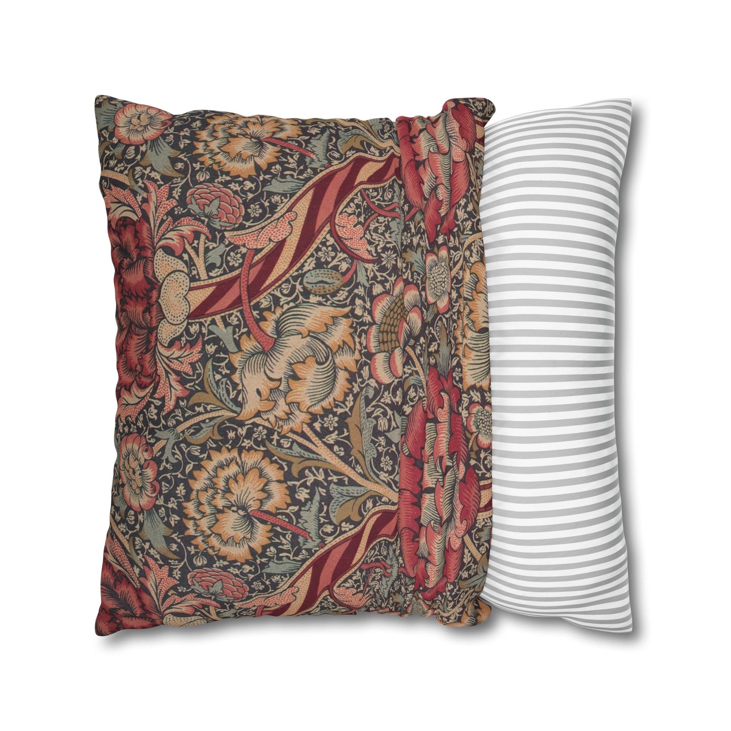 Two pillows, one with floral pattern and one with stripes, on a white background