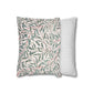 Two pillows, one with a leaf pattern and the other with a striped pattern, on a white background.