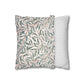 Two pillows, one with a leaf pattern and the other with a striped pattern, on a white background.
