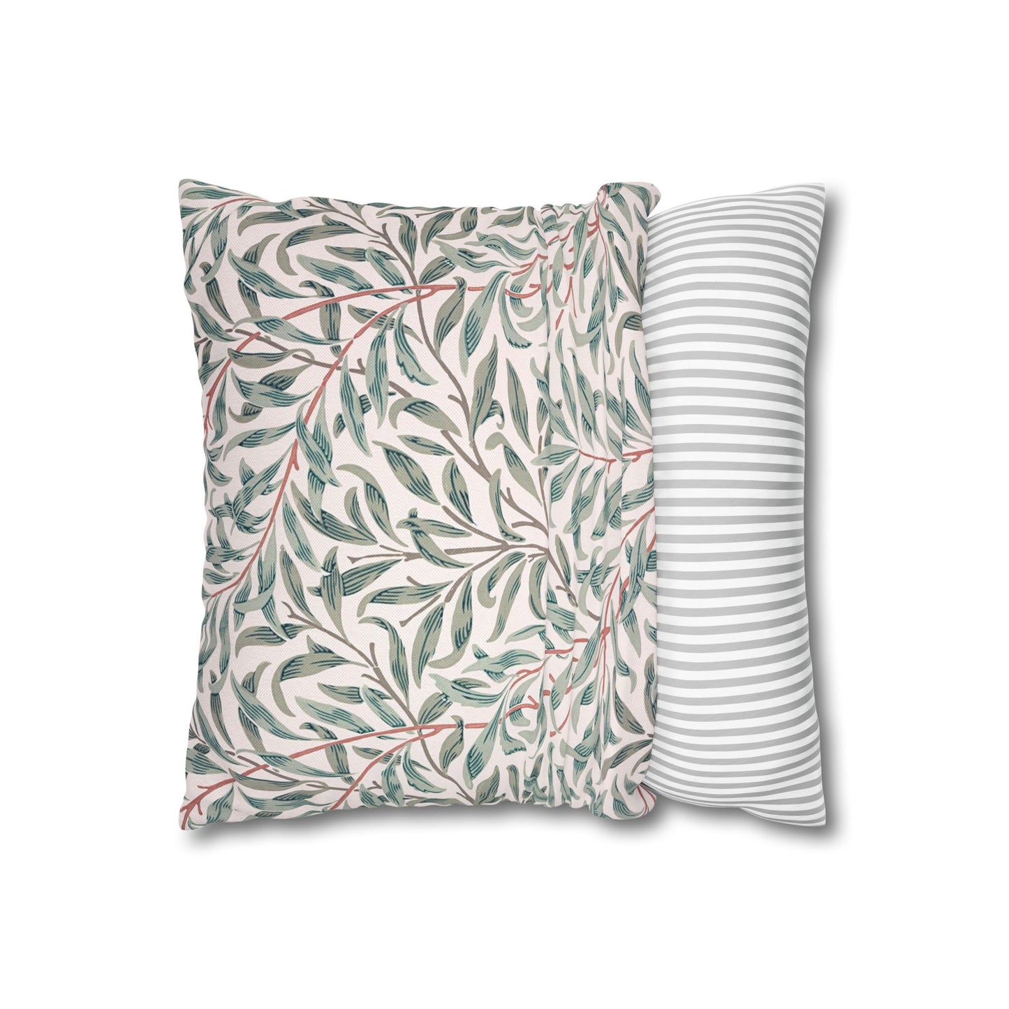 Two pillows, one with a leaf pattern and the other with a striped pattern, on a white background.
