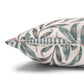 Decorative pillow with leaf pattern on a white background