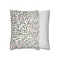 Two pillows, one with a leaf pattern and the other with a striped pattern, on a white background.