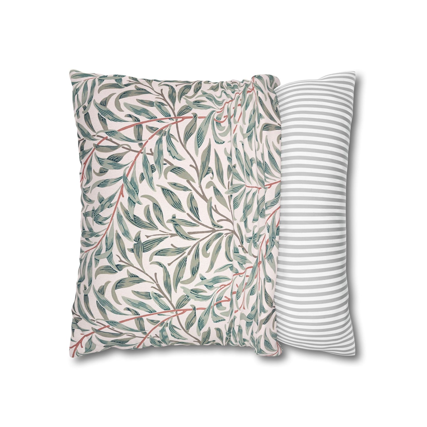 Two pillows, one with a leaf pattern and the other with a striped pattern, on a white background.