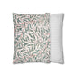 Two pillows, one with a leaf pattern and the other with stripes, on a white background.
