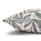 Decorative pillow with leaf pattern on a white background