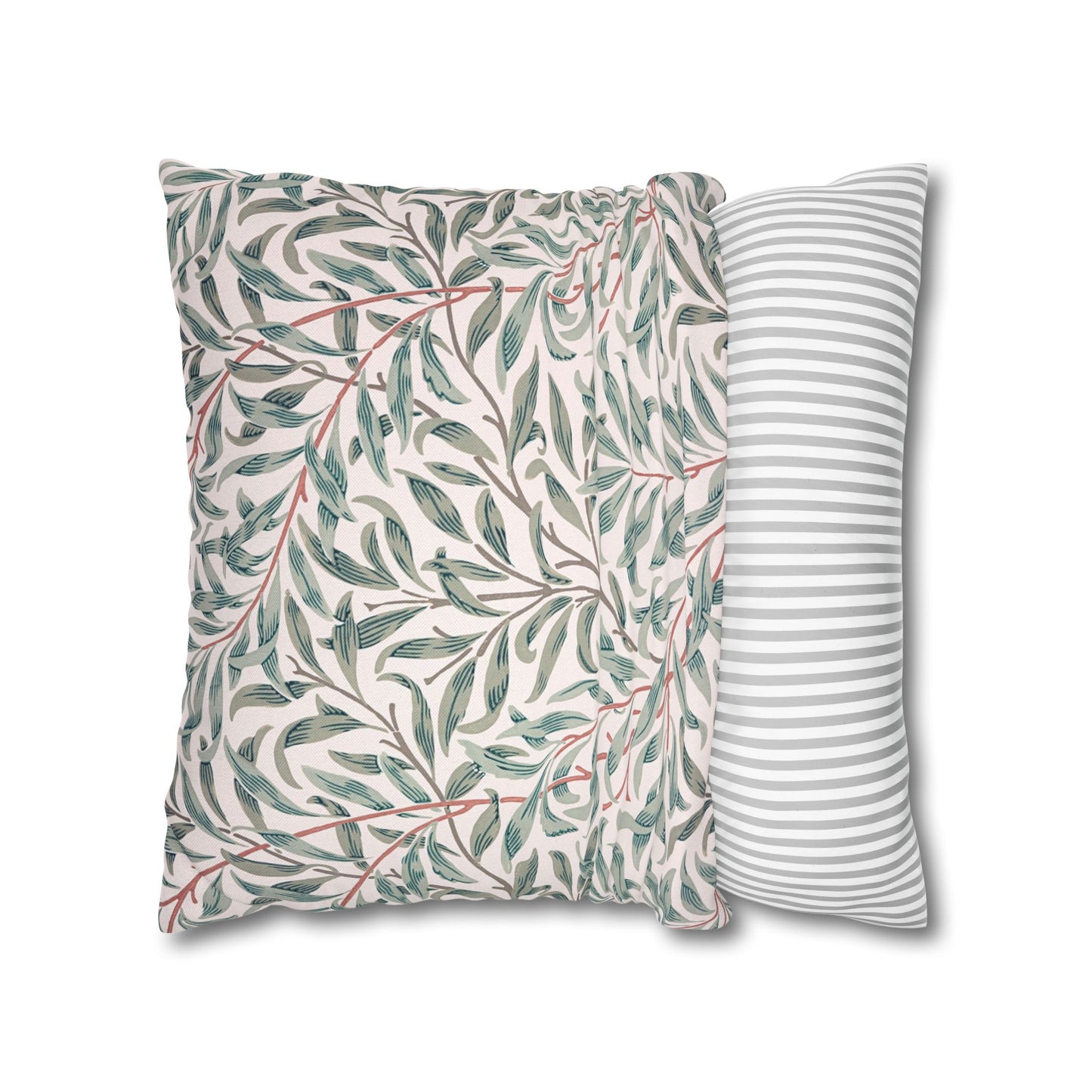 Two pillows, one with a leaf pattern and one with a striped pattern, on a white background.
