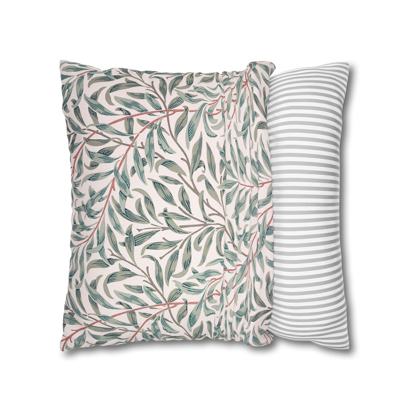 Two pillows, one with a leaf pattern and the other with a striped design, on a white background.
