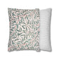Two pillows with leaf pattern and striped design on a white background
