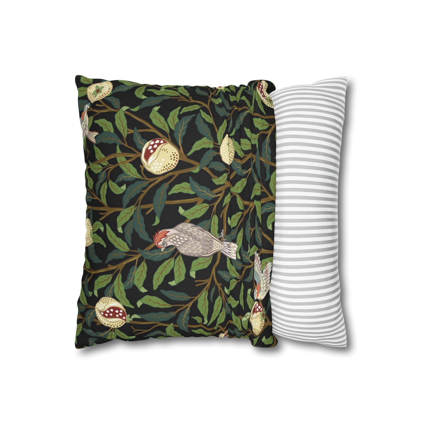 Decorative pillow with nature-themed design and a plain striped pillow on a white background