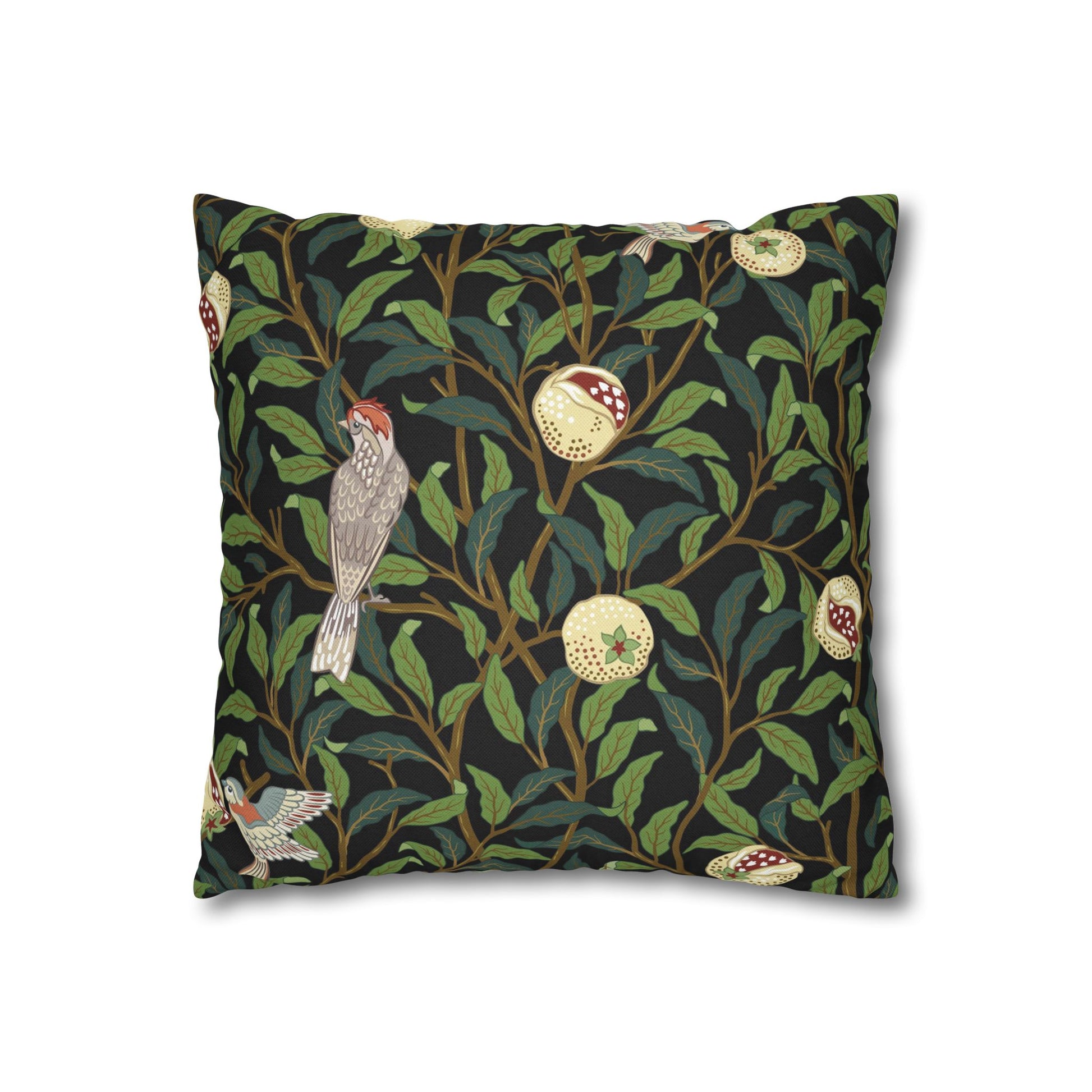 Decorative pillow with bird and leaf pattern on a black background