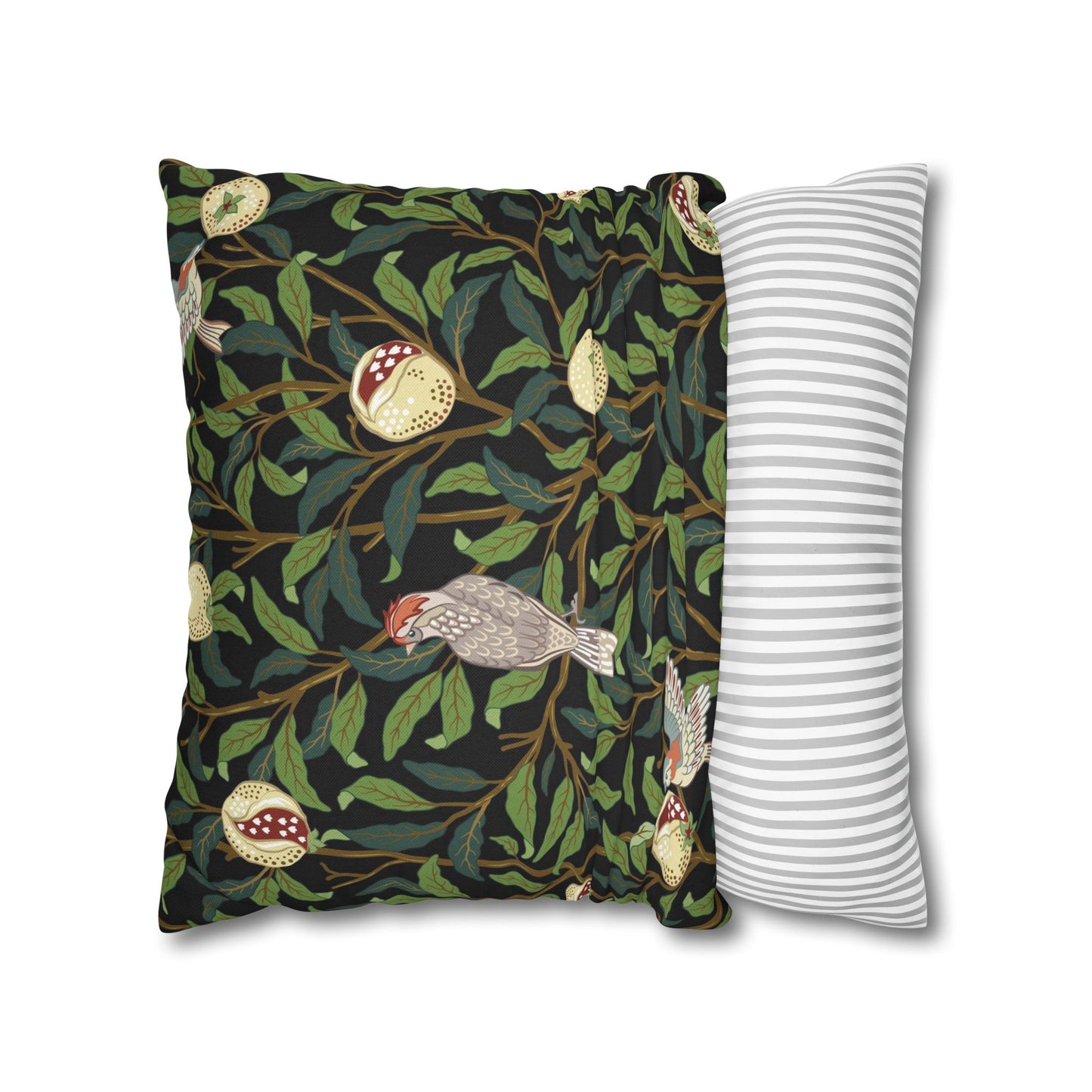 Decorative pillow with nature-themed design and a plain striped pillow on a white background