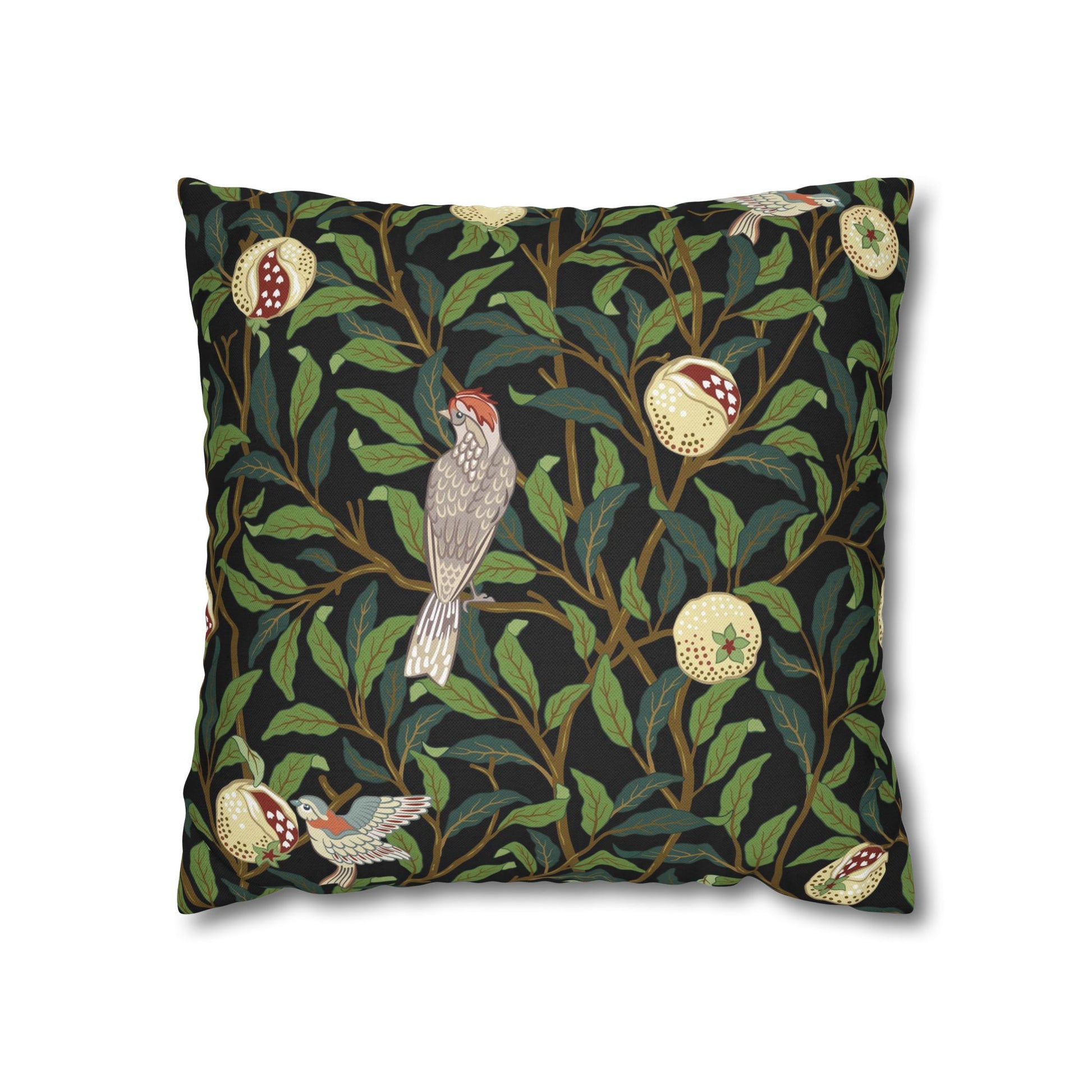 Decorative pillow with bird and leaf pattern on a black background