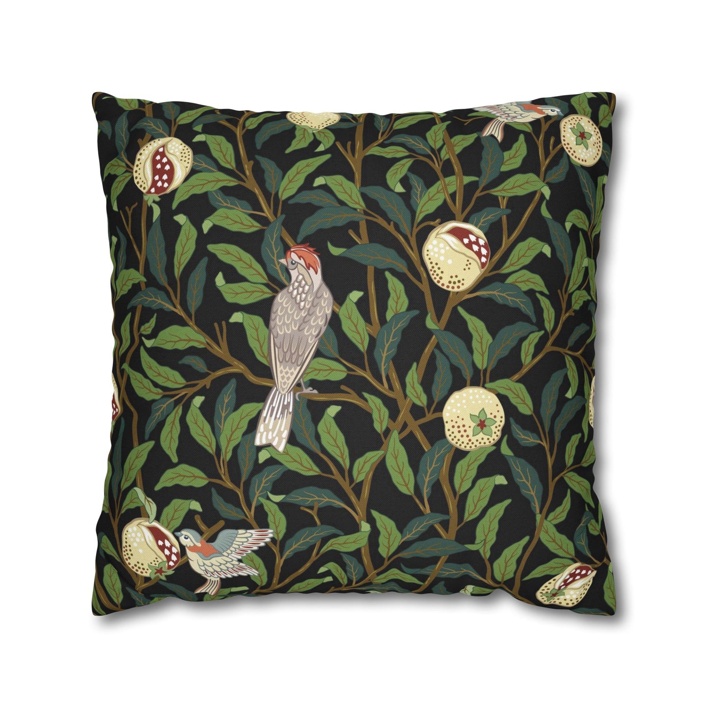 Decorative pillow with bird and leaf pattern on a black background