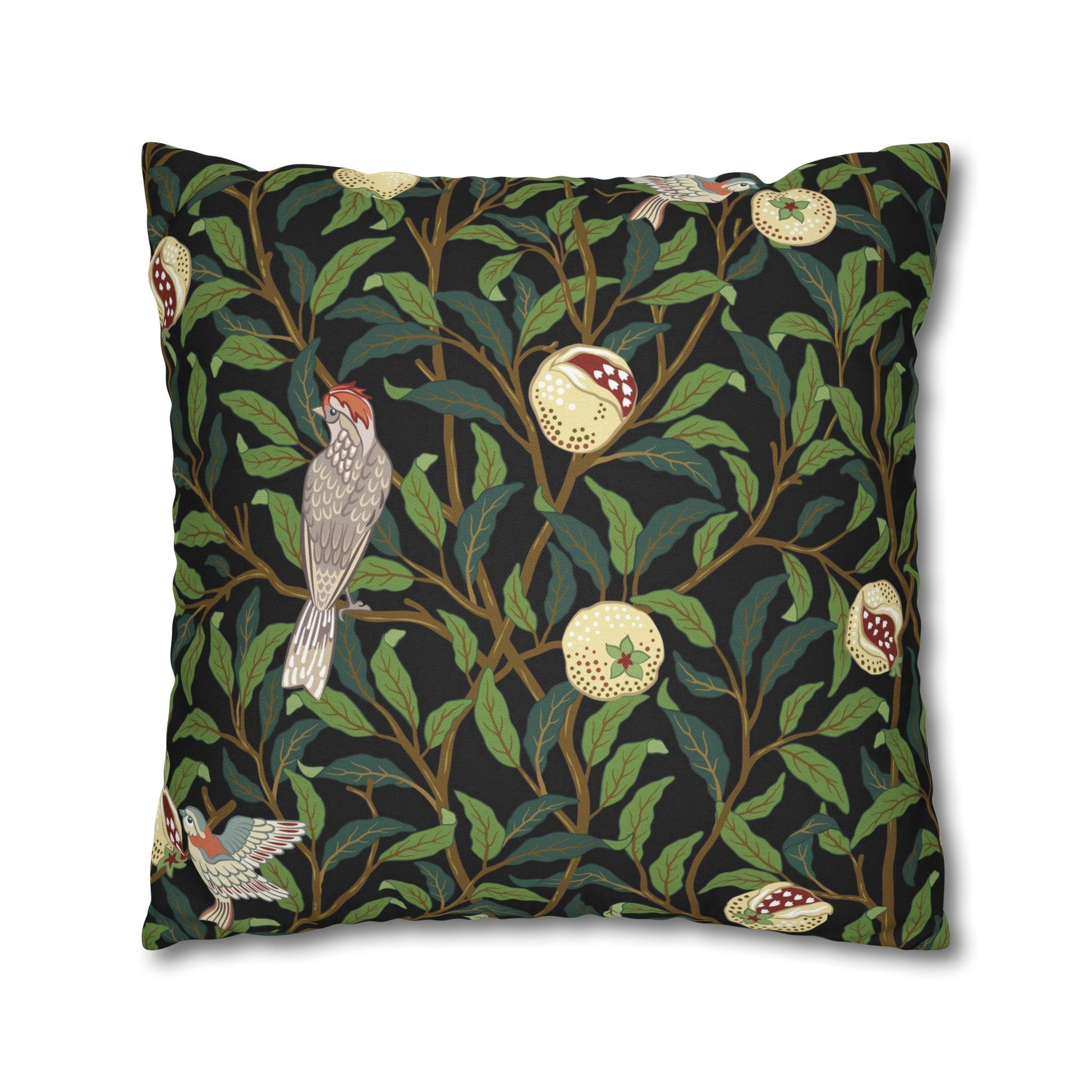 Decorative pillow with nature-themed design featuring birds and leaves on a black background