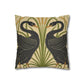 Decorative pillow with black bird design on a beige background