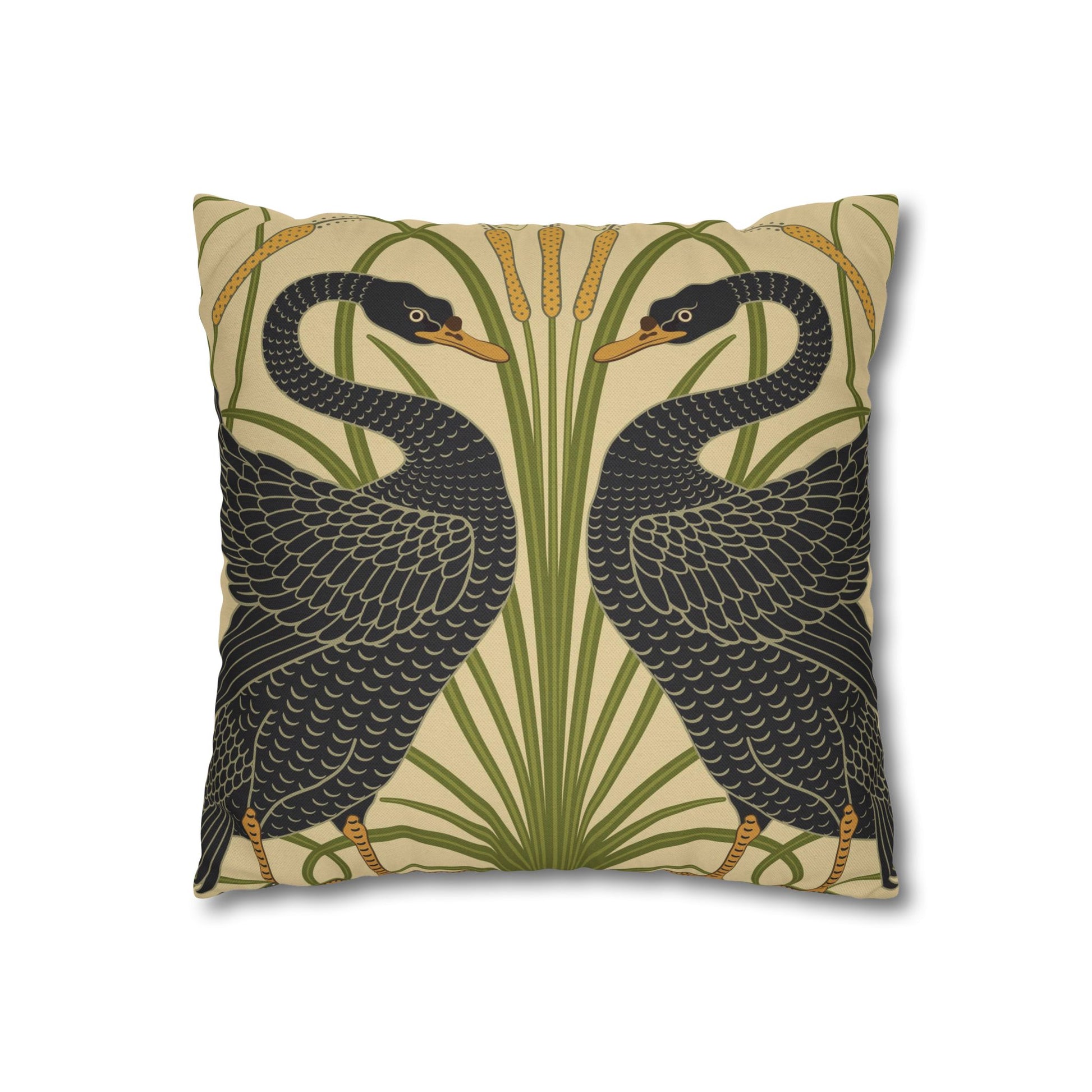 Decorative pillow with black bird design on a beige background