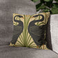 Decorative pillow with bird design on a gray sofa