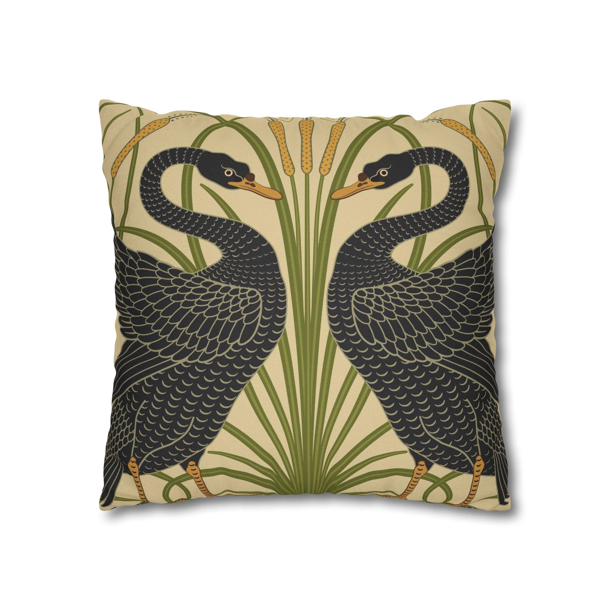 Decorative pillow with black bird design on a beige background