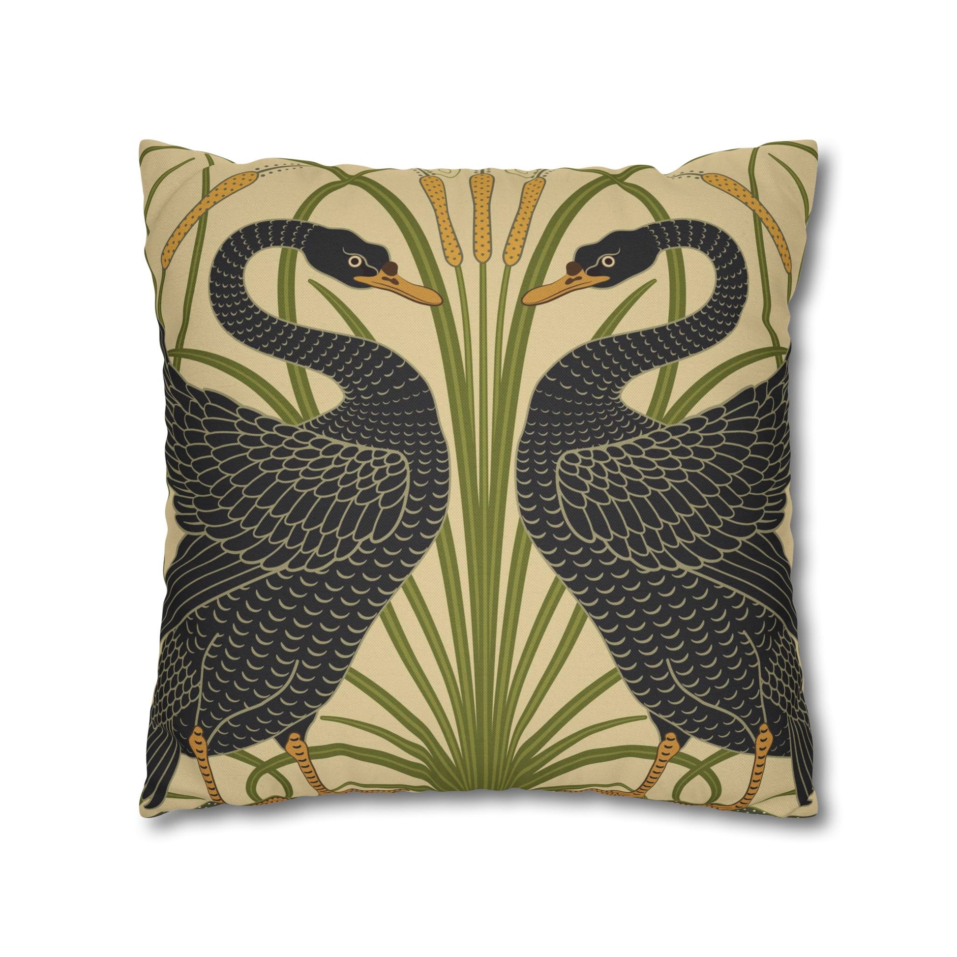 Decorative pillow with black bird design on a beige background