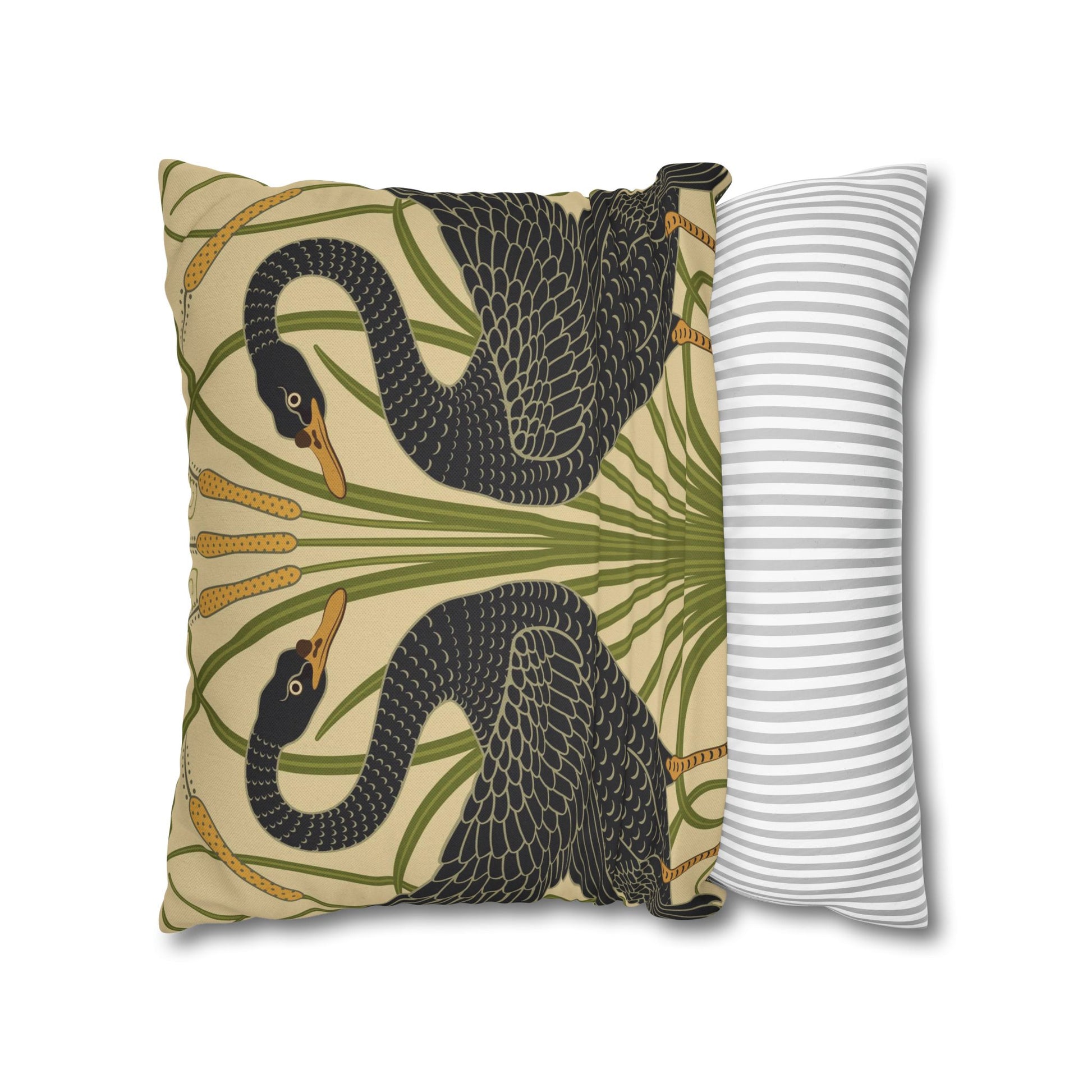 Decorative pillow with black swan design and a striped pillow on a white background