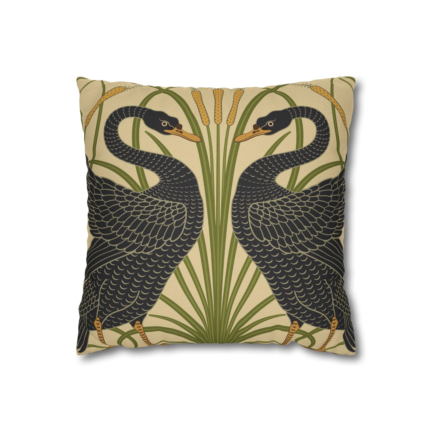 Decorative pillow with black bird design on a beige background