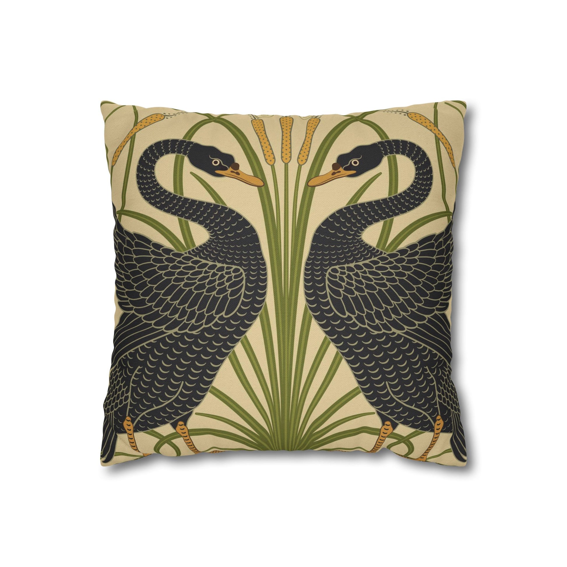 Decorative pillow with black bird design on a beige background