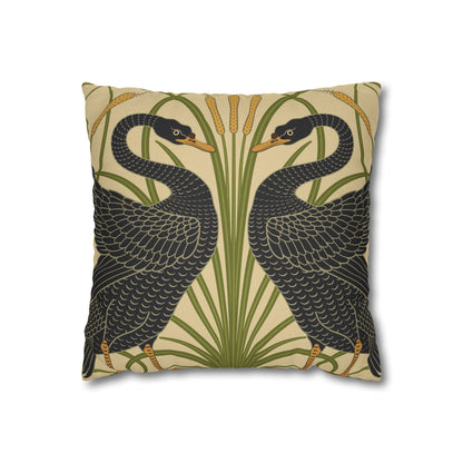 Decorative pillow with black bird design on a beige background