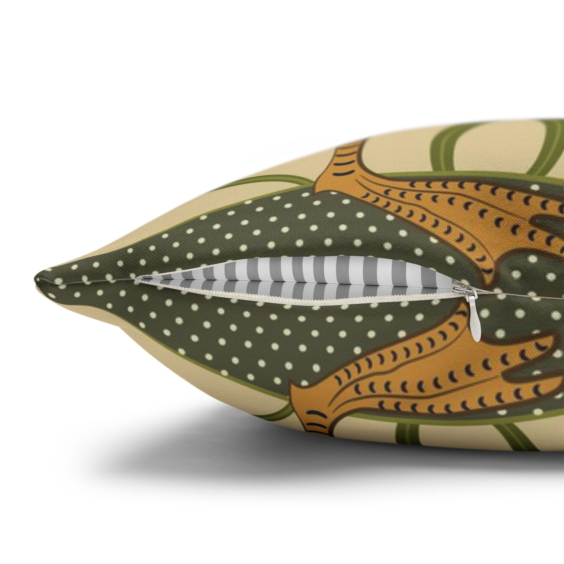 Decorative pillow with polka dot interior on a white background