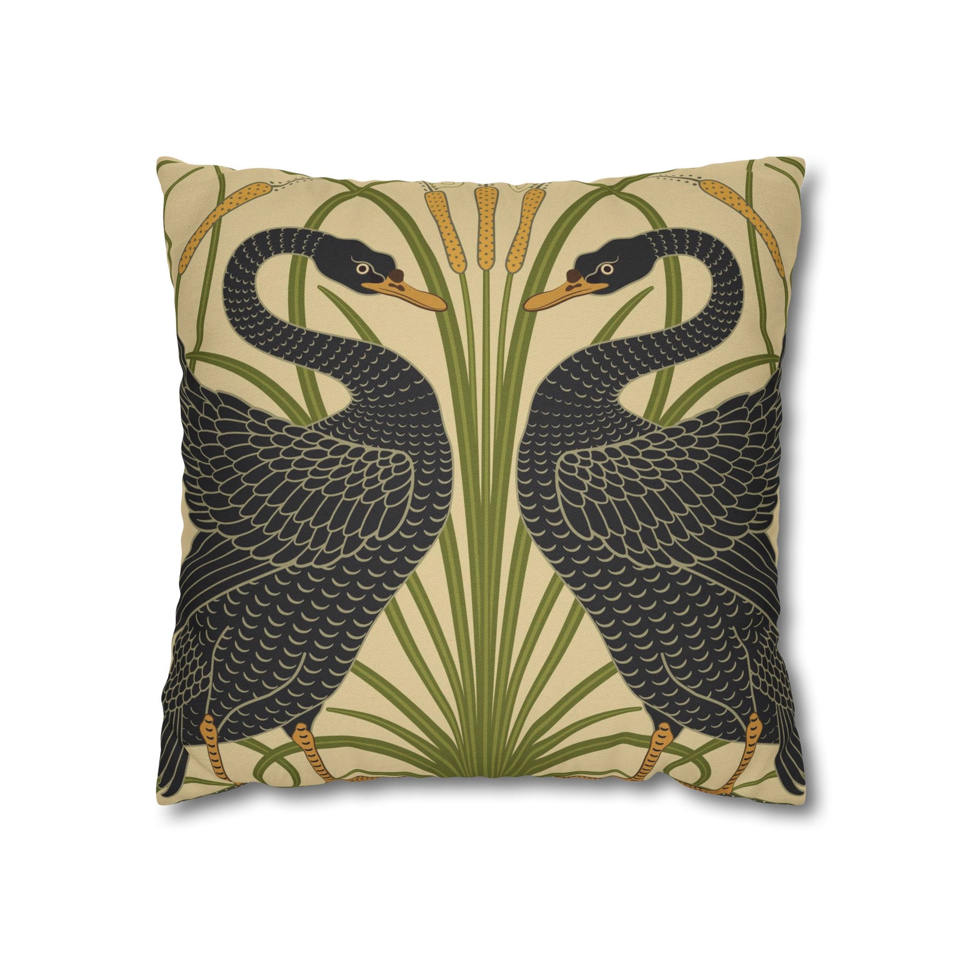 Decorative pillow with black bird design on a beige background