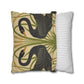 Decorative pillow with swan design next to a striped pillow on a white background