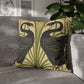 Decorative pillow with bird design on a gray sofa