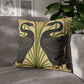 Decorative pillow with bird design on a gray sofa